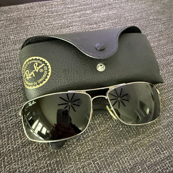 Gun metal with dark green lenses. Original with case. Slightly used